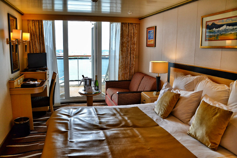 Luxury cabin and balcony on board Cunard's Queen Mary 2, during the Three Queens 175 Anniversary cruise visit to Liverpool